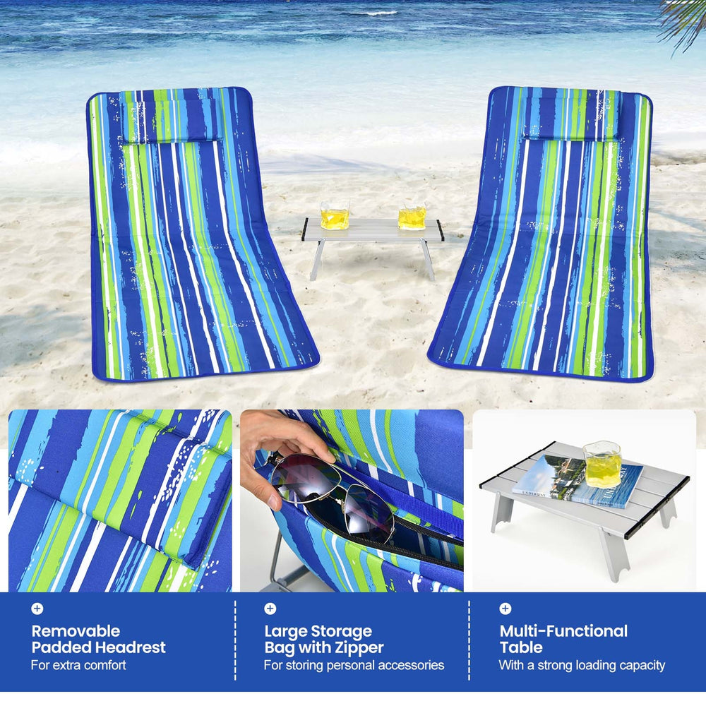 Two adjustable beach lounge chairs with a folding table, featuring a striped design and removable headrest for comfort.