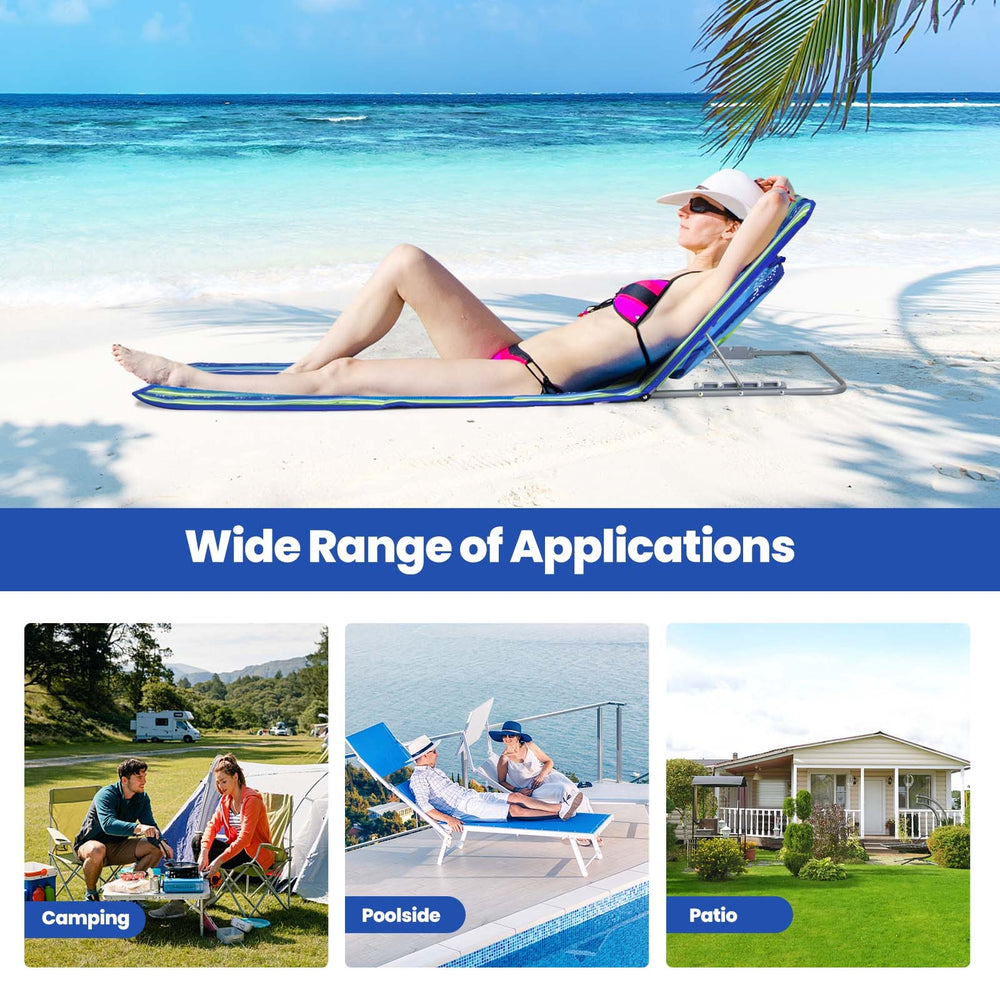 Two adjustable beach lounge chairs with a folding table, perfect for sunbathing and outdoor activities.