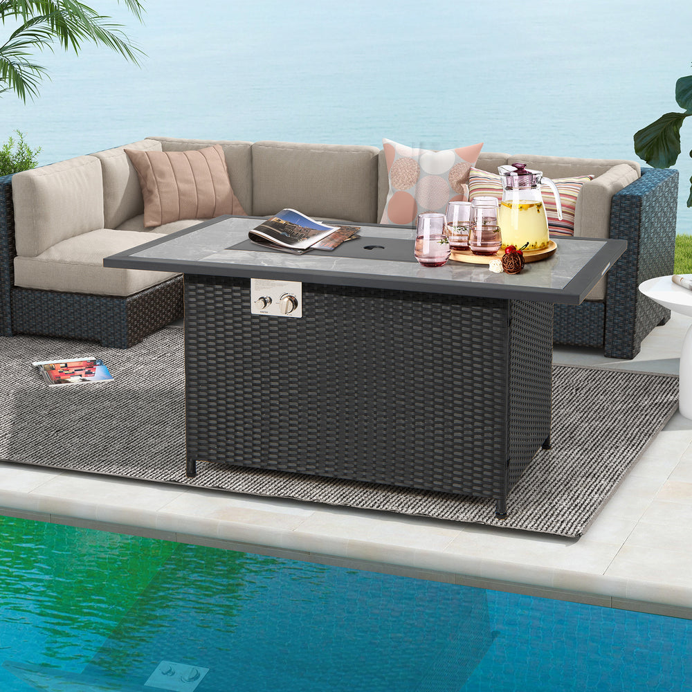 52-inch black rattan wicker propane fire pit table with marble top, ideal for outdoor heating and storage.