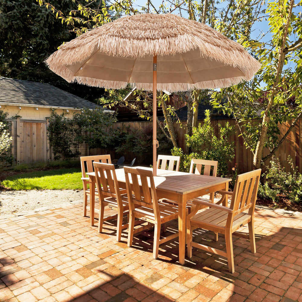 Thatched tiki umbrella with a durable polyester canopy, ideal for adding tropical style to patios or backyards.