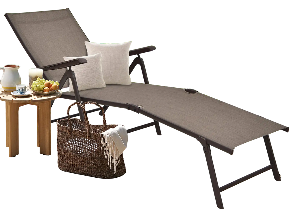 Brown patio foldable chaise lounge chair with backrest and footrest, perfect for garden or poolside relaxation.