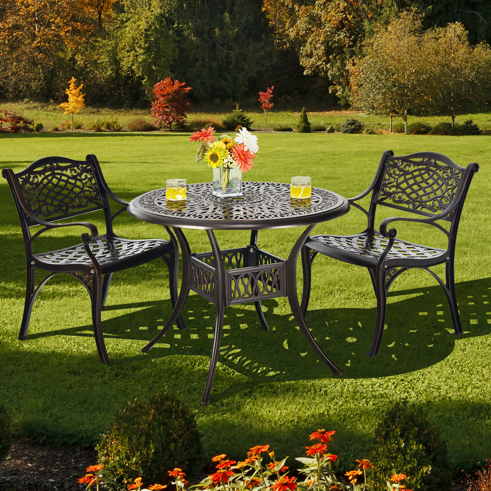 Round 36-inch brown patio dining bistro table with umbrella hole and elegant patterns, perfect for outdoor settings.