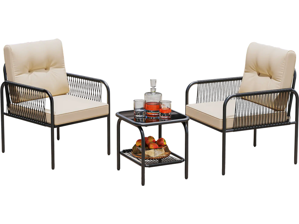 Two beige cushioned patio chairs with a glass top table, made of durable PE rattan, perfect for outdoor conversation.