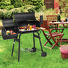 Outdoor BBQ grill with side shelf, durable steel construction, perfect for patio cooking and outdoor gatherings.