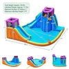 Inflatable dual water slide bounce house with climbing, sliding, and water sprayers for summer fun, holds 3 kids.