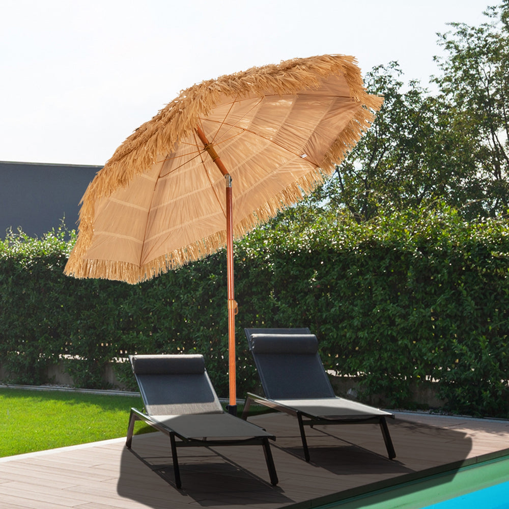 Thatched Tiki beach umbrella with adjustable tilt, 6.5 feet, portable design for outdoor relaxation by the pool.