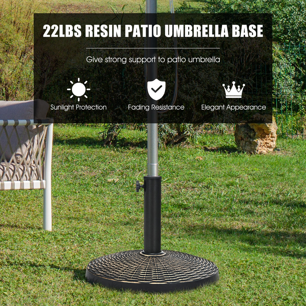 22lbs patio resin umbrella base with wicker style, designed for stability and elegance in outdoor settings like gardens.