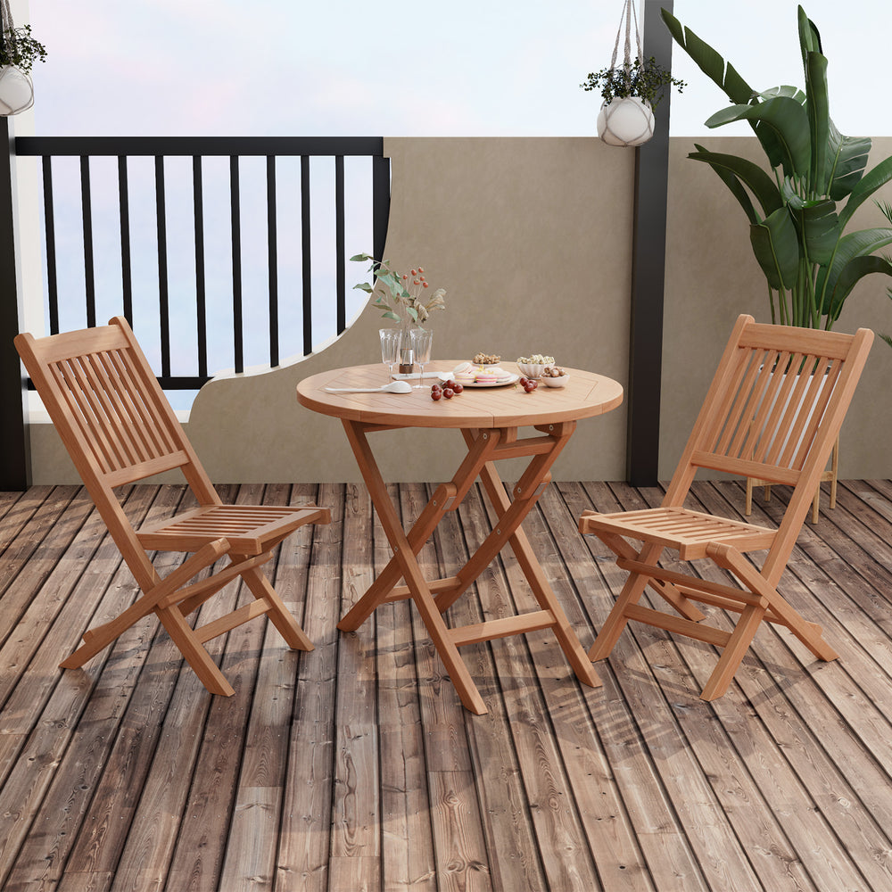 Outdoor bistro set featuring slatted teak wood chairs and table, perfect for backyard or poolside relaxation.