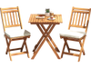 Outdoor wood bistro set featuring acacia frame, soft seat cushions, and a folding table, ideal for balcony or backyard.