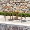 Light brown patio barstools with rattan seats and metal backrests, perfect for poolside relaxation and backyard.