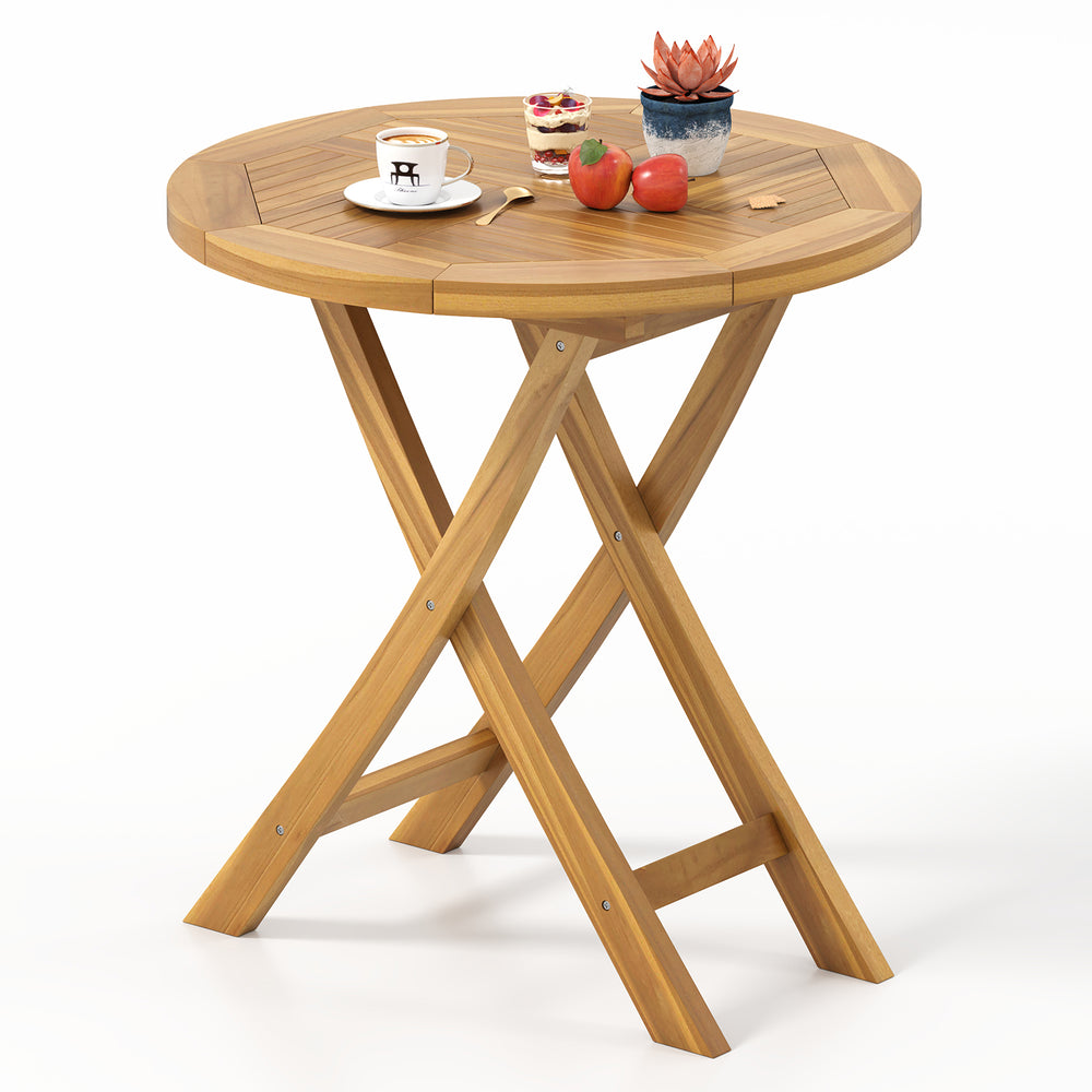 Teak wood dining table with slatted top and X-shaped frame, perfect for outdoor dining on patio or balcony.