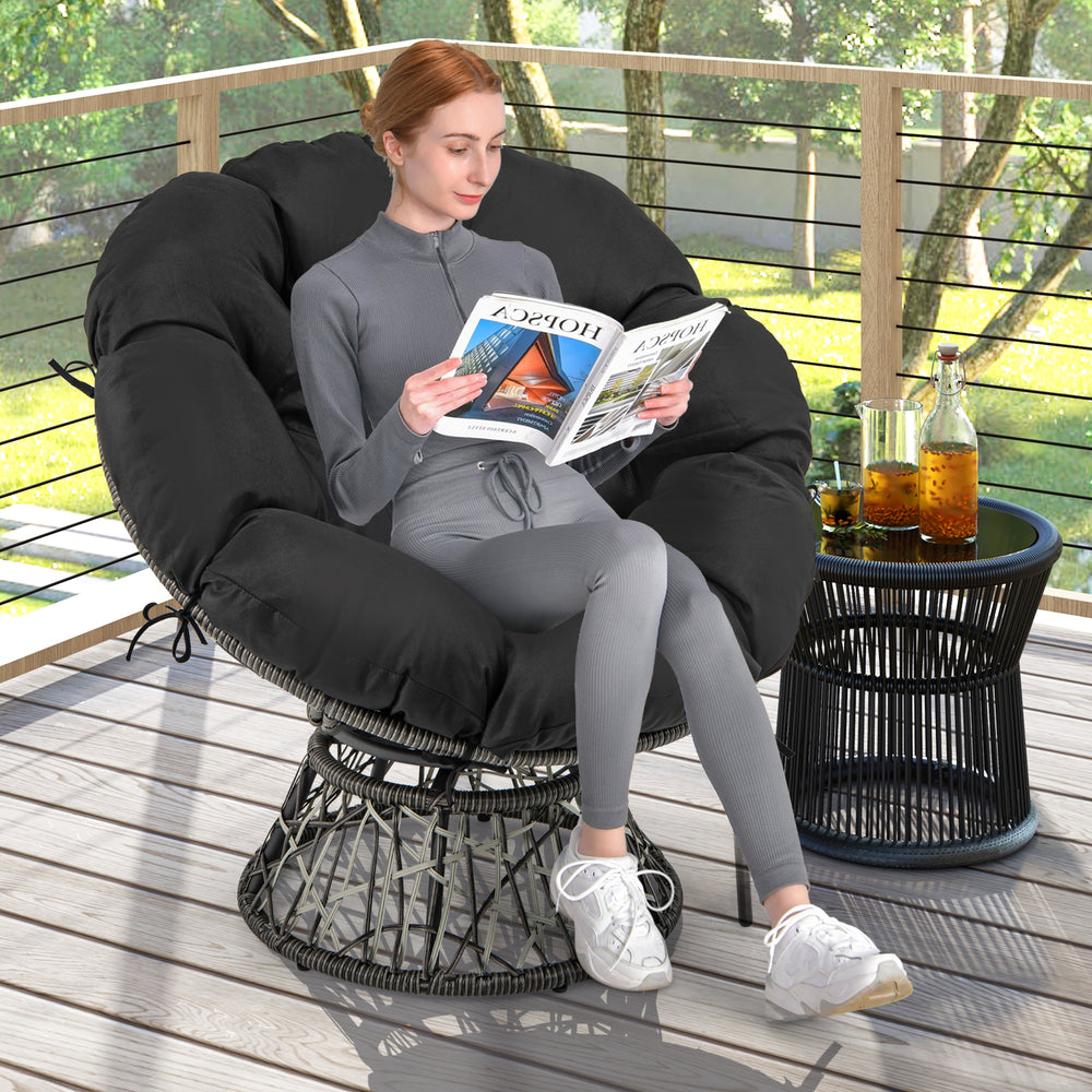 Overstuffed black PE wicker papasan chair with removable cushion, perfect for indoor or outdoor relaxation.