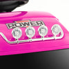 Close-up of the pink 6V kids electric ride-on truck's decorative LED lights and power logo for fun and safety.