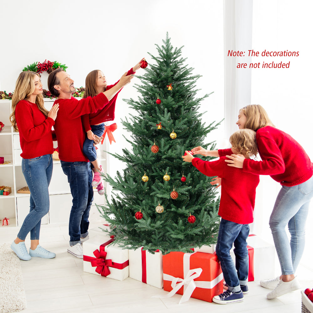 Pre-lit artificial Christmas tree with 778 branch tips and warm white LED lights, perfect for holiday gatherings.