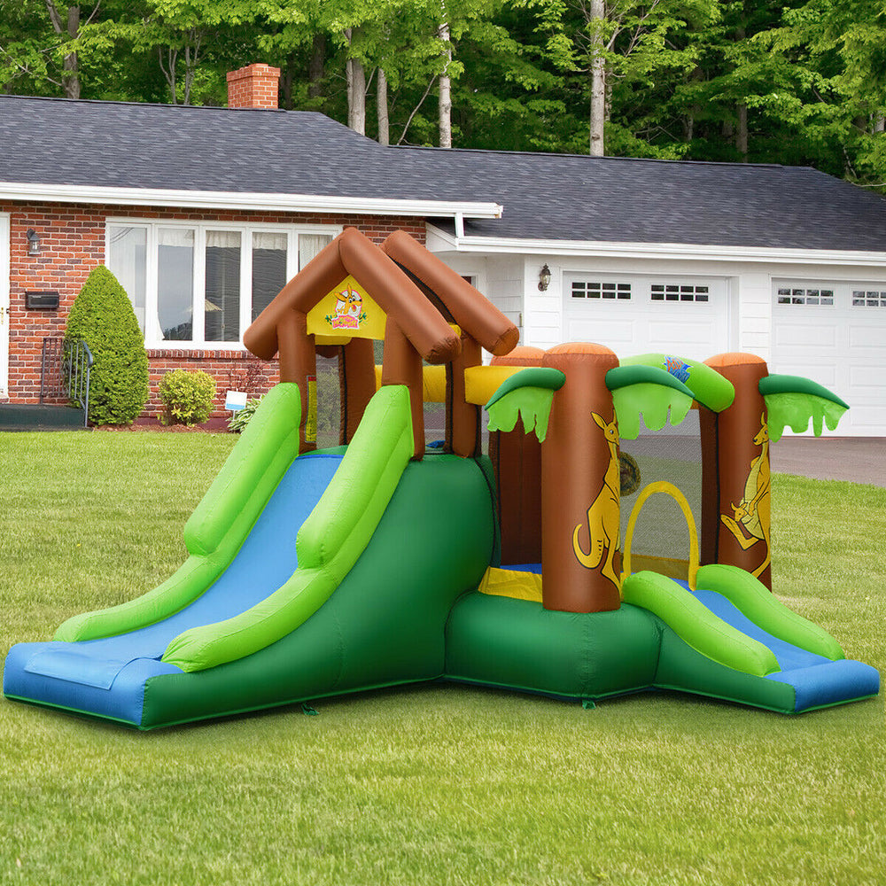 Inflatable jungle bounce house with dual slides, climbing wall, and safety nets, perfect for kids aged 3 to 10.