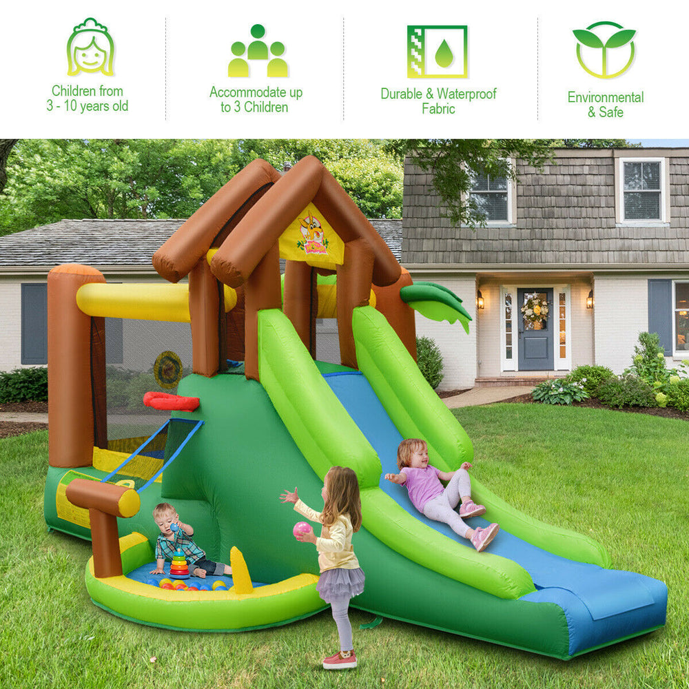 Inflatable jungle bounce house with slides and climbing wall, made of puncture-resistant PVC fabric, for outdoor fun.