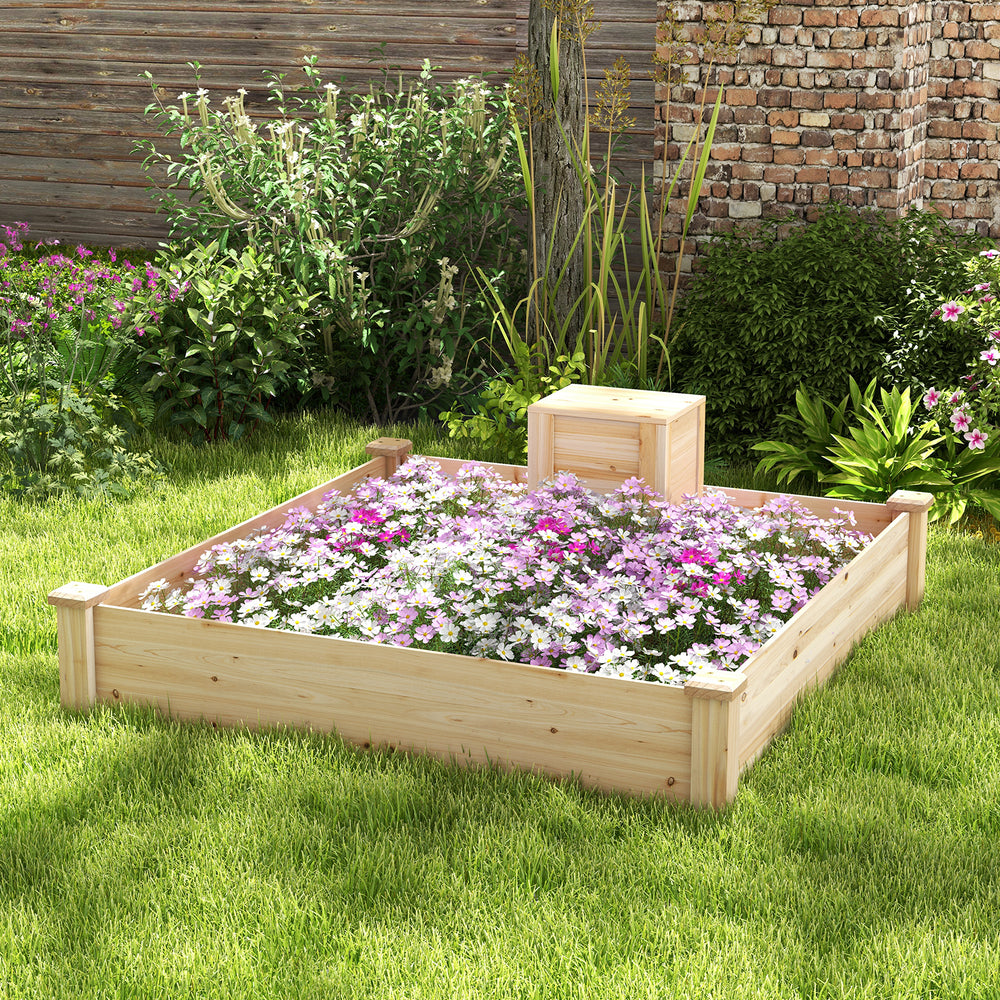 Raised garden bed made of fir wood with compost bin, featuring flowers and an open-ended bottom for drainage.