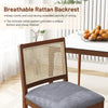 Rattan dining chair with rubber wood frame and padded linen seat, featuring a breathable rattan backrest for comfort.
