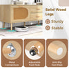 Rattan TV stand with solid wood legs, dual drawers, and adjustable foot pads for stable support and easy cleanup.
