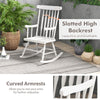 White rocking chair with solid rubber wood frame, slatted high backrest, and curved armrests for indoor and outdoor.