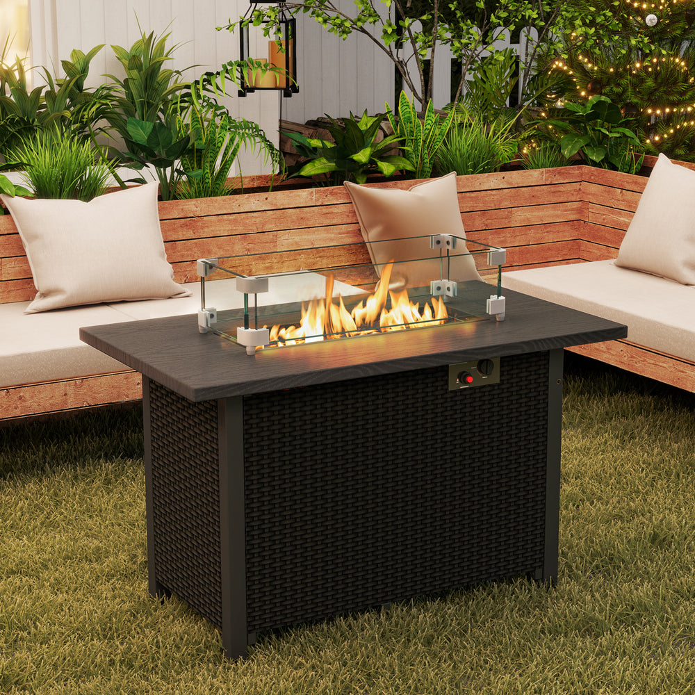 Black propane gas fire pit table with wind guard and glass rocks, featuring a removable lid for versatile use.