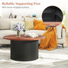 Round coffee table with walnut wooden top and wave-shaped support post, offering ample storage and stability for any.