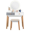 Makeup dressing table with lighted round mirror, four drawers, and solid beech wood legs for elegant bedroom decor.