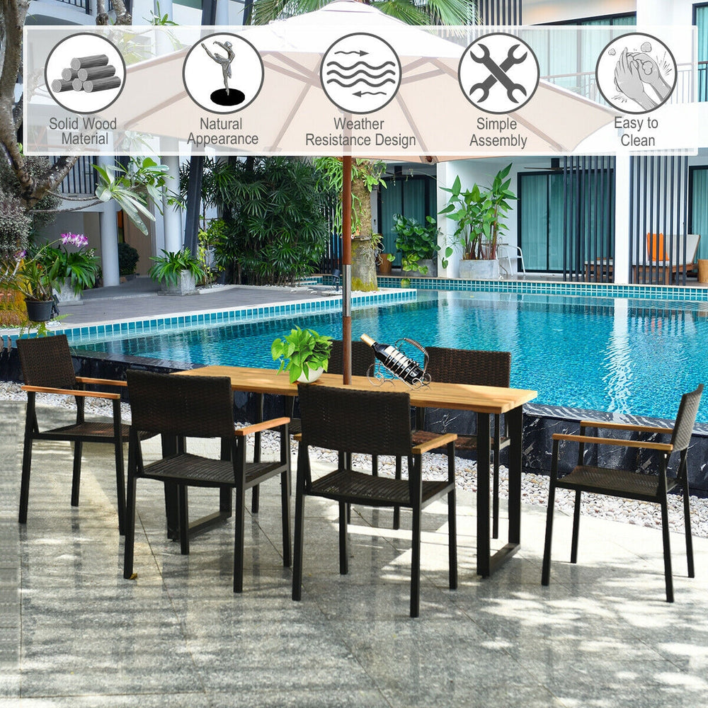 7-piece outdoor dining set featuring a large acacia wood table and weather-resistant rattan chairs, perfect for.