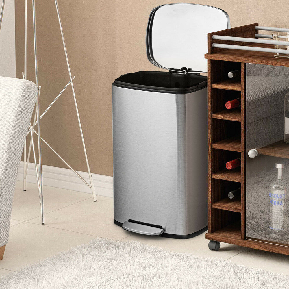 Stainless steel 13.2-gallon trash can with a plastic bucket and noiseless lid, ideal for home or office use.