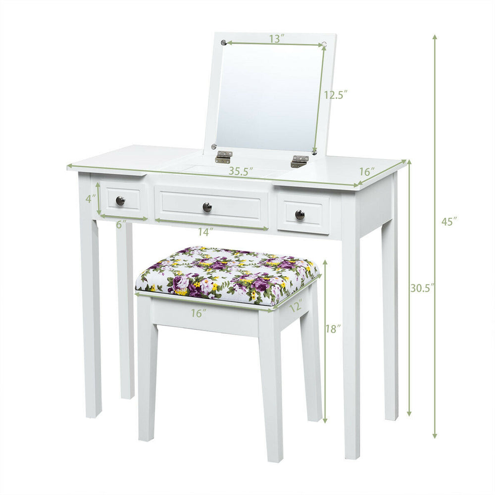 Vanity dressing table set with flip top mirror, three drawers, and floral cushioned stool for compact spaces.