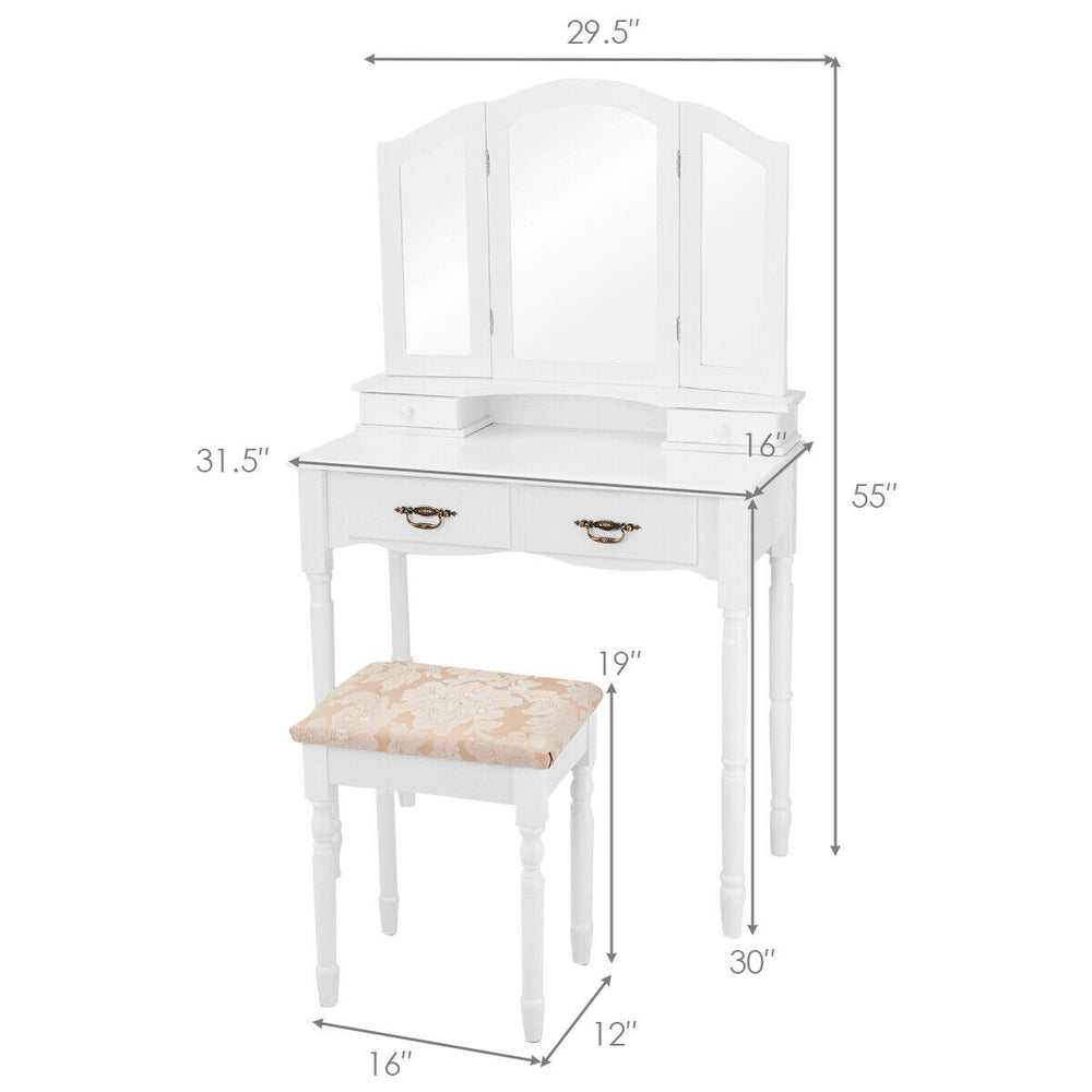 White vanity set with tri-fold mirror, four drawers, and cushioned stool, perfect for bedroom makeup organization.