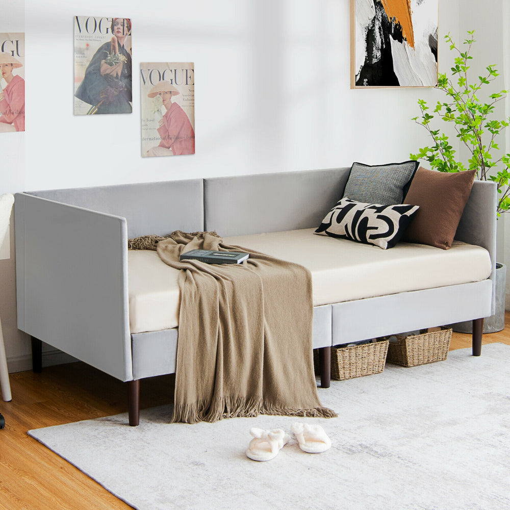 Twin size daybed frame in gray with soft velvet fabric, sturdy wood slat support, ideal for small spaces and versatile.