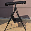Black steel frame loveseat swing glider with waterproof canopy and cushioned seats for outdoor relaxation.