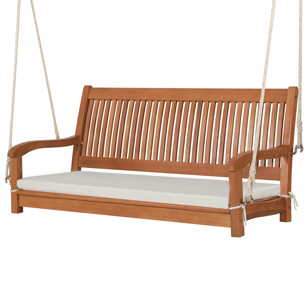 2-person hanging porch swing bench with solid wood frame and cushion, ideal for backyard relaxation and comfort.