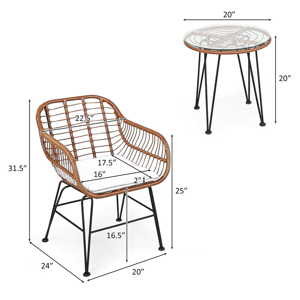 Patio rattan bistro set featuring two armchairs and a side table, with navy cushions, ideal for outdoor relaxation.