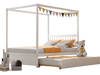 Full size white canopy bed with trundle, solid wood frame, decorated with flags, ideal for kids' bedrooms.