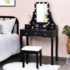 Close-up of the black vanity dressing table's 360° mirror and crystal drawer handles, showcasing elegant design and.