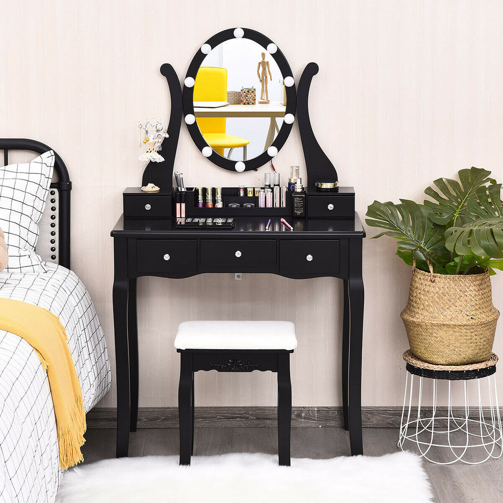 Black vanity table set showcasing a 360° rotating mirror with 10 adjustable LED lights, perfect for a stylish makeup.