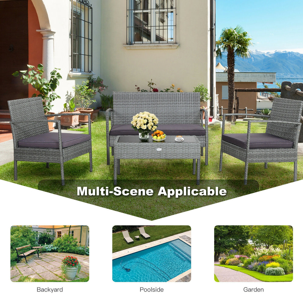 4-piece outdoor rattan conversation set featuring a loveseat and chairs with cushions, ideal for backyard or garden.