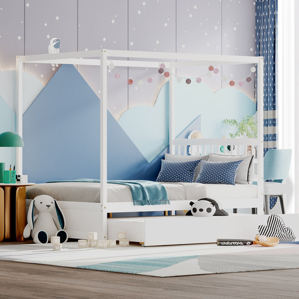 Full size white canopy bed with trundle, solid wood frame, decorated with flags and lights, perfect for kids' bedrooms.