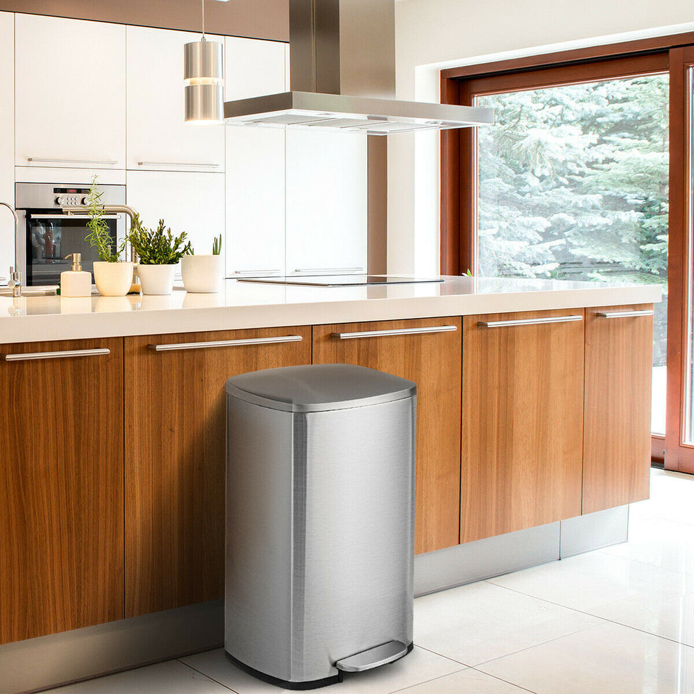 Stainless steel 13.2-gallon trash can with a plastic bucket, designed for easy lifting and noiseless lid operation.