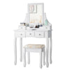 White makeup dressing vanity set with 5 drawers, removable top, and padded stool for comfortable use and stylish decor.