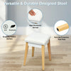 Cushioned stool with wooden legs, featuring a soft, breathable surface and non-slip feet pads for added comfort.