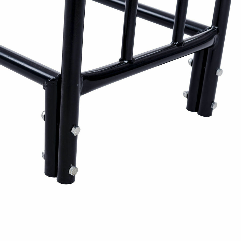 Close-up of the heavy-duty steel frame of a 4 feet outdoor firewood storage rack with a black powder-coated finish.