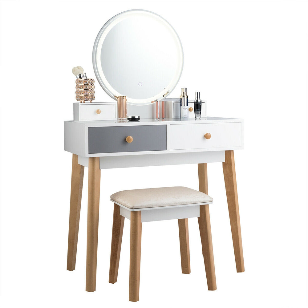 Vanity set featuring a touch-sensitive lighted mirror and spacious drawers, designed for organized makeup storage.