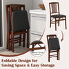 Foldable upholstered kitchen chairs with padded seat in brown, designed for space-saving and easy storage.