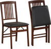 Set of 2 foldable kitchen chairs with padded seats in brown, featuring faux leather upholstery and sturdy rubber wood.