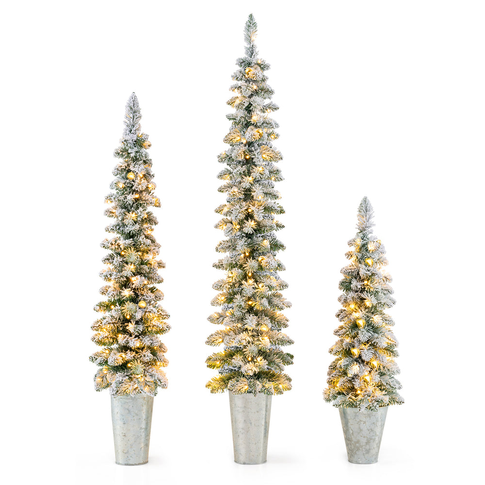 Set of 3 pre-lit snow flocked artificial Christmas trees in metal pots, featuring warm white LED lights and 423 branch.