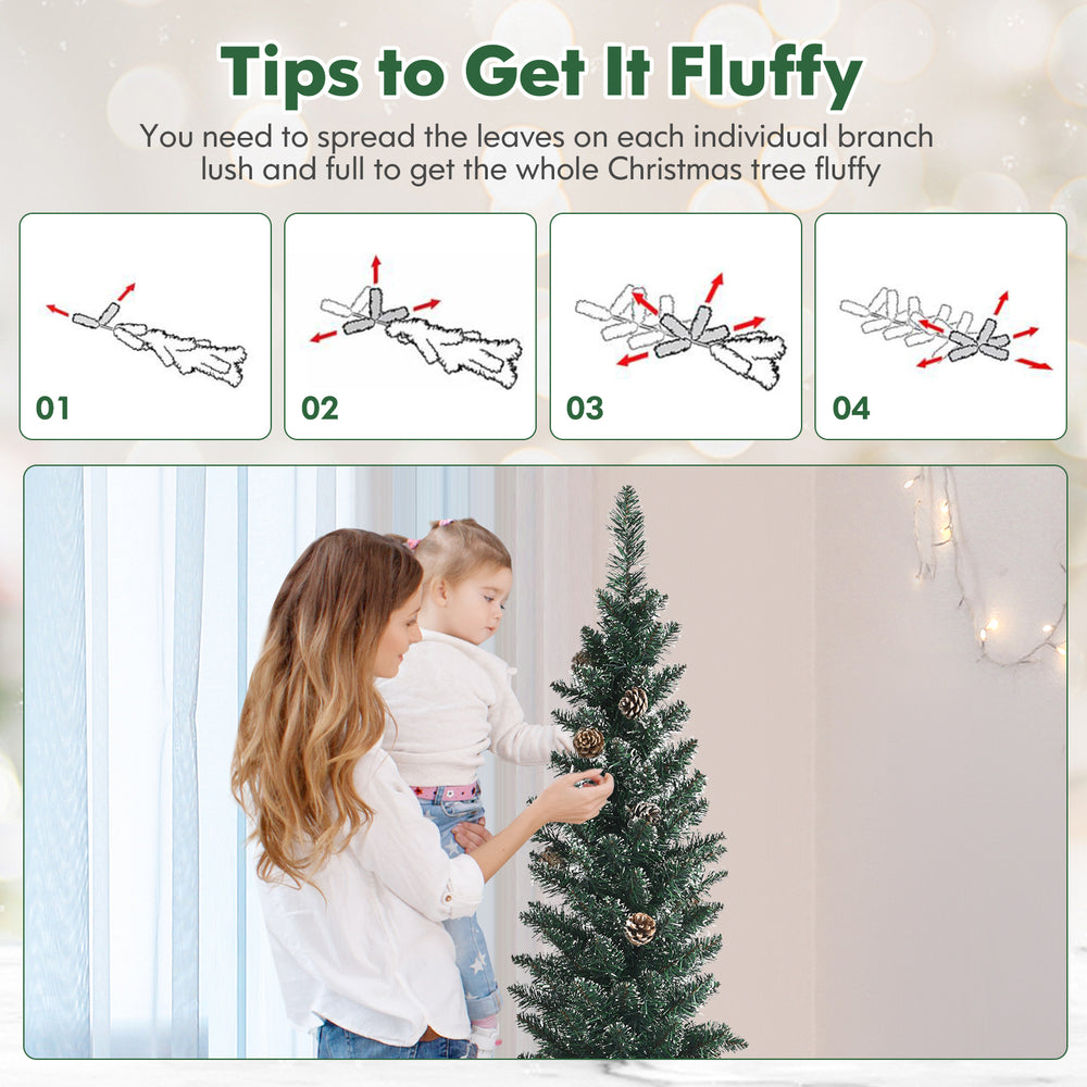 Snowy artificial pencil Christmas tree with pine cones, showcasing tips for fluffing branches for festive decoration.