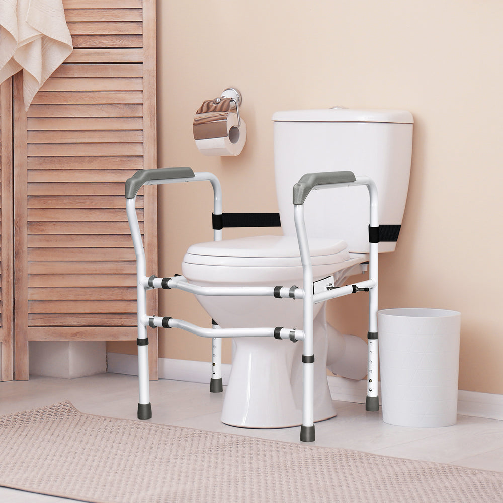 Steel safety toilet rail with adjustable height and width, designed for stability and support for elderly users.